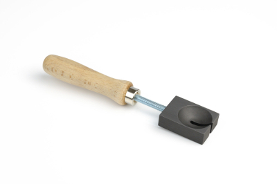 Small graphite paddle with a lens and a 3mm slot for mandrel